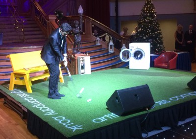 Golf superstar Rory McIlroy puts off the Artificial Grass Company Multi-Play putting grass at the Paddy Wallace Fund for Autism charity ball at Titanic Centre, Belfast.