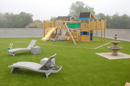 The ideal low maintenance family garden transformed by the Artificial Grass Company.